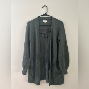 Green MUDD sweater with purple embroidery flowers